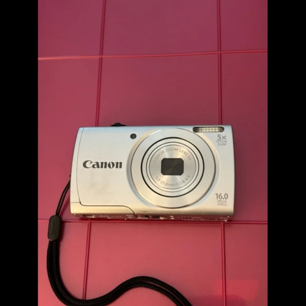 Canon Silver Digital Camera with Black Case